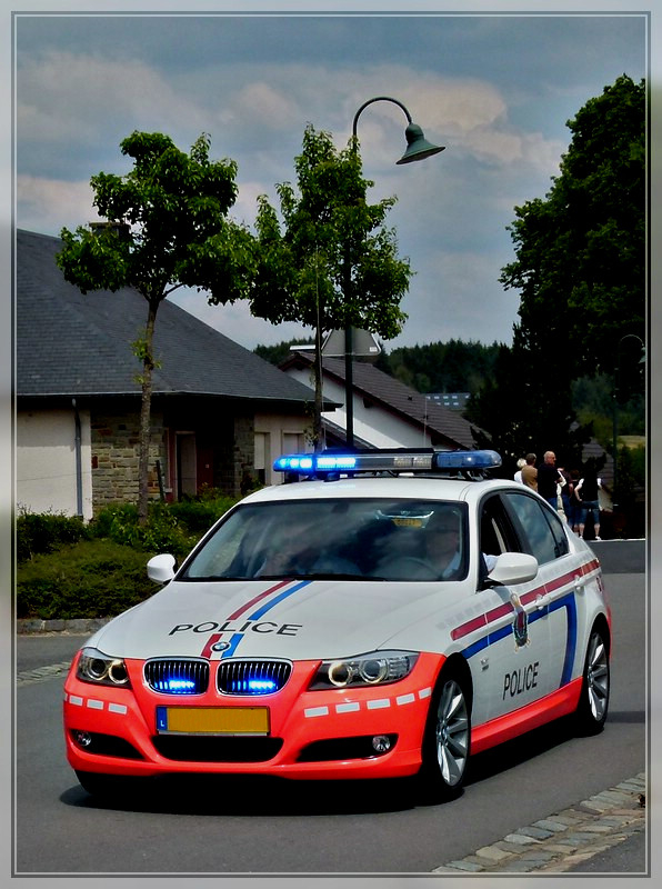 BMW der Luxemburgischen Polizei bei der diesjhrigen  Skoda Tour de Luxembourg  aufgenommen am 04.06.2011.