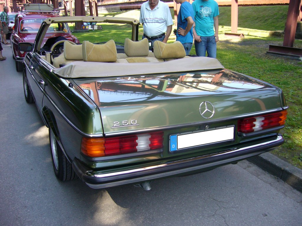Heckansicht eines Mercedes Benz W123 250 Cabrioletumbau der Hagener Firma Bhr. Oldtimertreffen Kokerei Zollverein am 07.070.2013.
