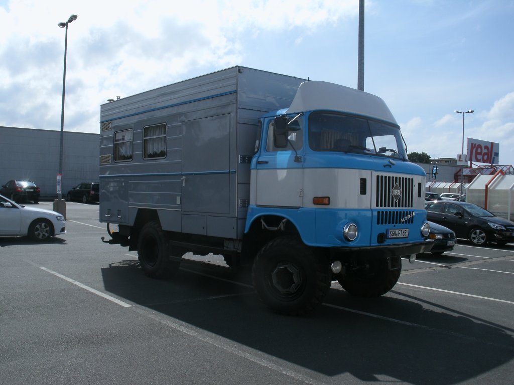 IFA W50 als Wohnmobil,am 02.Juli 2012,vor einem Supermarkt in Bergen/Rgen.