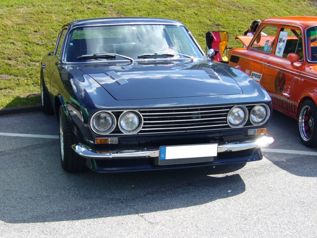 OSI 20M TS. 1967 - 1968. Das elegante Coupe wurde 1966 auf dem Genfer Salon vorgestellt und wurde ab Januar 1967 ber das Ford-Hndlernetz vertrieben, da die Motorisierung von Ford stammte. Es wurde wahlweise der V6-motor mit 1.998 cm und 90 PS oder der V6 mit 2.293 cm und 108 PS verbaut. Von den ca. 2.000 in Turin produzierten Autos wurden 1.279 Stck in Deutschland verkauft. Oldtimertreffen beim TVWuppertal am 10.06.2012.