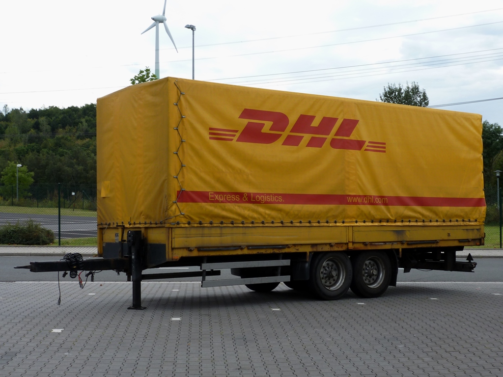 Tandem Anhnger mit DHL Express & Logistics  Pritscheplane in Herten abgestellt am 28.08.2012
