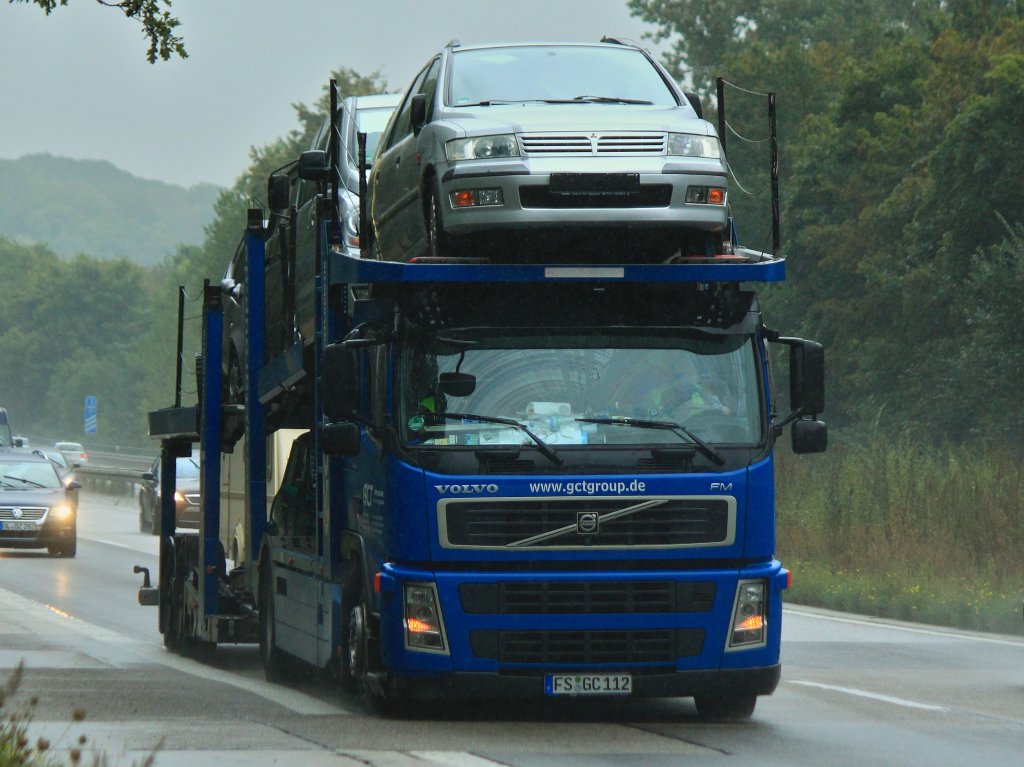 Volvo FM Autotransporter mit Tandemhnger am 11.09.2012 auf der A4 kurz vor der Niederlndischen Grenze.

