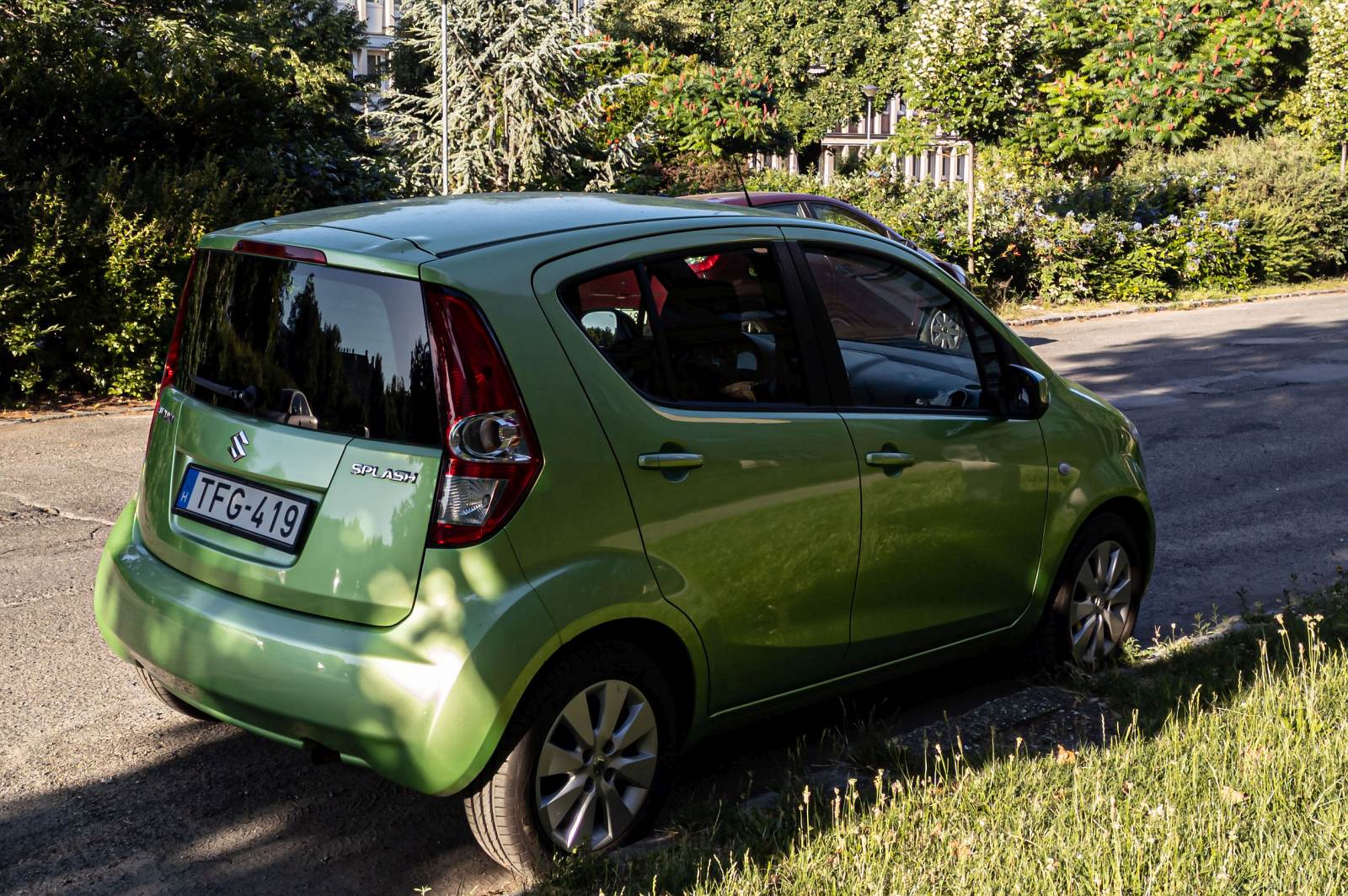 Rückansicht / Seitenansicht: Suzuki Splash, in der Farbe  Splash Green . Die Aufnahme stammt von Juni, 2022.