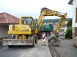 Komatsu Bagger PW95R bei Grabenverfllarbeiten nach einer Gasleitungsverlegung in 36100 Petersberg-Marbach am 18.07.08