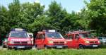 Mehrere Mannschaftswagen von verschiedenen Freiwilligen Feuerwehren in Zeulenroda zum Deutschlandcup im Feuerwehrsport. Foto 06.07.13