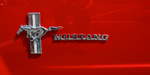 Logo und Schriftzug an einem Ford Mustang GT von 1965.