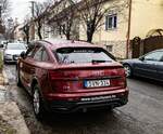 Rückansicht: Audi Q5 Sportback in der Farbe Matador Rot. Foto: 12.2021.