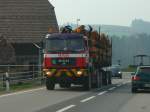 MAN Holztransporter unterwegs bei Hasle am 09.04.2010