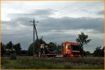 FEHRENKTTER No2: ACTROS MP2 1841 mit einem alten Traktor und einer Bodenbearbeitungsmaschine(?) ist bei Beelen unterwegs. (03.09.2009)
