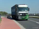 Mercedes-Benz Actros 1844 LKW der Firma EKB Container Logistik aus Bremen fhrt am 24.August.2009 ber eine Brcke Richtung Hafengebiet!