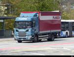 Scania mit Pritschenaufbau unterwegs in der Stadt Olten am 17.04.2023