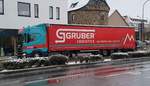 =Scania-Sattelzug von GRUBER-Logistics rollt im Dezember 2020 durch Fulda