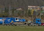 Scania Schwerlastsattelzug beladen mit einem Liebherr 934 Kettenbagger aufgenommenam 11.03.2014.