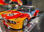Dieser BMW E9 3.0 CSL aus dem Jahr 1975 ist das erste von mittlerweile 19 BMW Art Car Modellen. Der Wagen wurde 1975 vom US-amerikanischen Künstler Alexander Calder (*1898 +1976) gestaltet. Seinen ersten Rennauftritt hatte das Coupe beim 24 Stunden Rennen von Le Mans im Jahr 1975. Am Steuer saßen bei diesem Rennen die beiden französischen Rennfahrer Hervé Poulain und Marcel Mignot. BMW Museum in München am 06.07.2021.