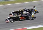 Formel 3 Team Lotus Zweikampf am 4.8.2013  Nr.:3 Marvin Kirchhfer(DEU) Nr.: 1 Artem Markelov(RUS)  beide auf Lotus Dallara F311 VW Power 