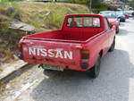 Heckansicht eines Nissan B120 Pickup (in verschiedenen Exportländern auch Datsun B120 genannten) Pickup, wie er von 1971 bis 1979 produziert wurde.
