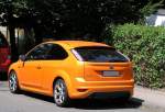Ford Focus ST (2008-2010, Orange). Aufnahme: juli 2010 Frankfurt-Sachsenhausen.