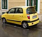 Rückansicht / Seitenansicht: Hyundai Atos Prime (PRE-facelift) in Tweety Yellow.