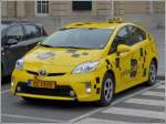 Toyota Prius als yellow CAB Taxi vom ACL unterwegs, aufgenommen am Bahnhof von Luxemburg am 12.10.2013. Diese Taxen stehen nur den Miegliedern des Luxemburger Automobil Clubs zur verfgung und vekehren nur innerhalb der Luxemburgischen Landesgrenzen. 