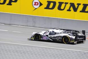 LMP2 Nr.30, Ligier JSP2 (Nissan VK45DE 4.5L V8) von Extreme Speed Motorsports, Fahrer;  Scott Sharp, Ed Brown, Johannes van Overbeek  bei den 84.