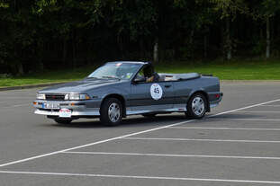 Chevrolet Cavalier Z24, BJ 1989, aufgenommen bei seiner Runde auf dem abgesperrten Parkplatz.