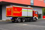 Feuerwehr Hanau Mitte MAN TGA WLF (Florian Hanau 1-66-1) mit AB-Gefahrgut am 04.10.25 bei einen Fototermin.