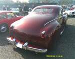 Heckansicht eines gechoppten Chrysler Series C25-Six Windsor Club Coupe aus dem Jahr 1940. Oldtimertreffen an Mo´s Bikertreff in Krefeld am 08.03.2026.