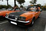 Opel Manta B im Farbton signalorange, gebaut von 1975 bis 1988.