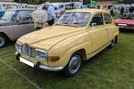 Saab 96 in der Lackierung alabaster yellow aus dem Modelljahr 1973.