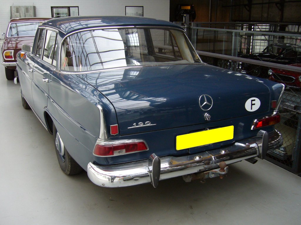 Heckansicht eines Mercedes Benz W110 190c. 1961 - 1965. Classic Remise Düsseldorf am 14.07.2012.
