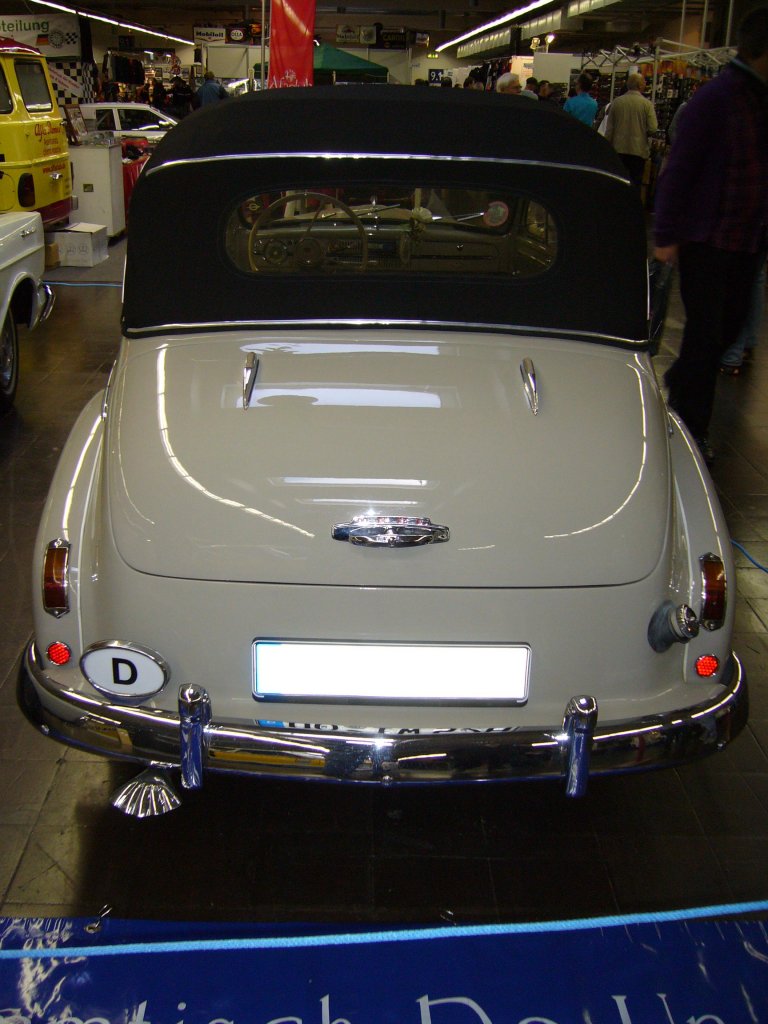 Heckansicht einer Opel Olympia Cabriolet Limousine. 1950 - 1952. Essen Motor Show am 29.11.2011.