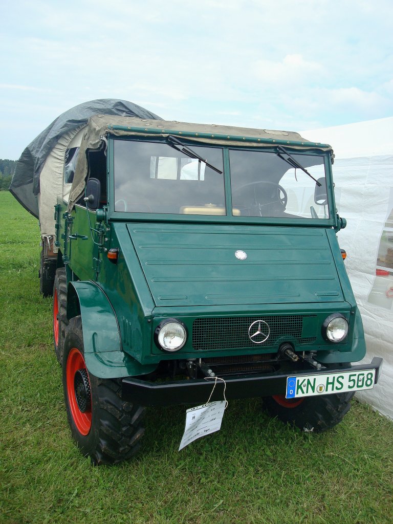 MB Unimog 411, 
4-Zyl.Dieselmotor mit 1800ccm und 34PS, Baujahr 1959,
Traktorentreff St.Peter, Aug.2010