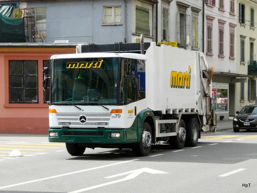Mercedes ECONIC Mllwagen unterwegs in Biel am 02.05.2013