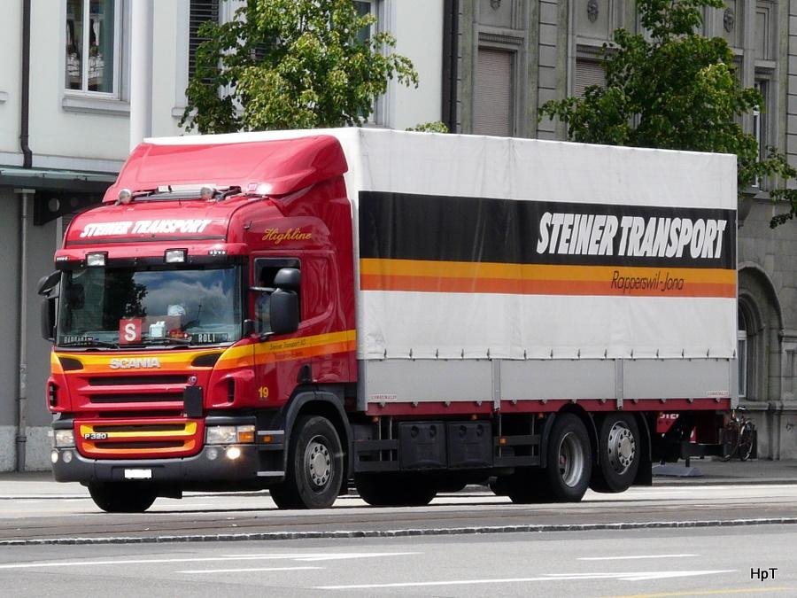 Scania P 320 mit Pritschenaufbau unterwegs in der Stadt Solothurn am 21.05.2010