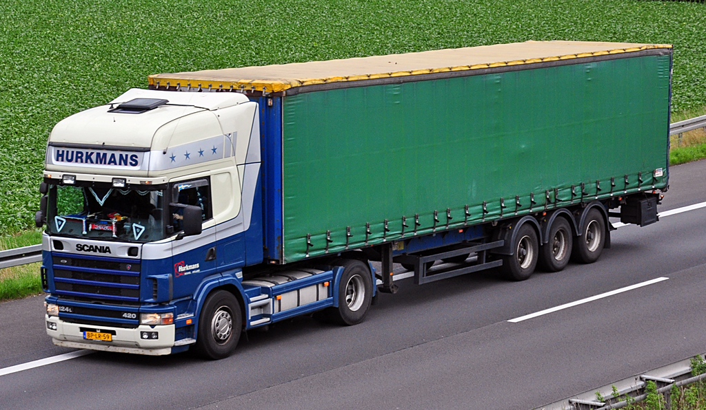 Scania R124L 420  Hurkmans  auf der A61 bei Rheinbach - 13.08.2010