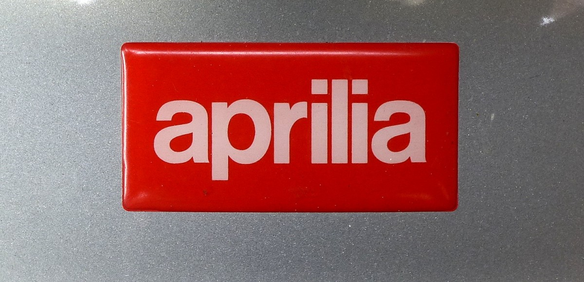 aprilia, Schriftzug der italienischen Motorrad-und Motorrollerfirma, gegrndet 1945, eine Tochtergesellschaft von Piaggio, Mai 2014