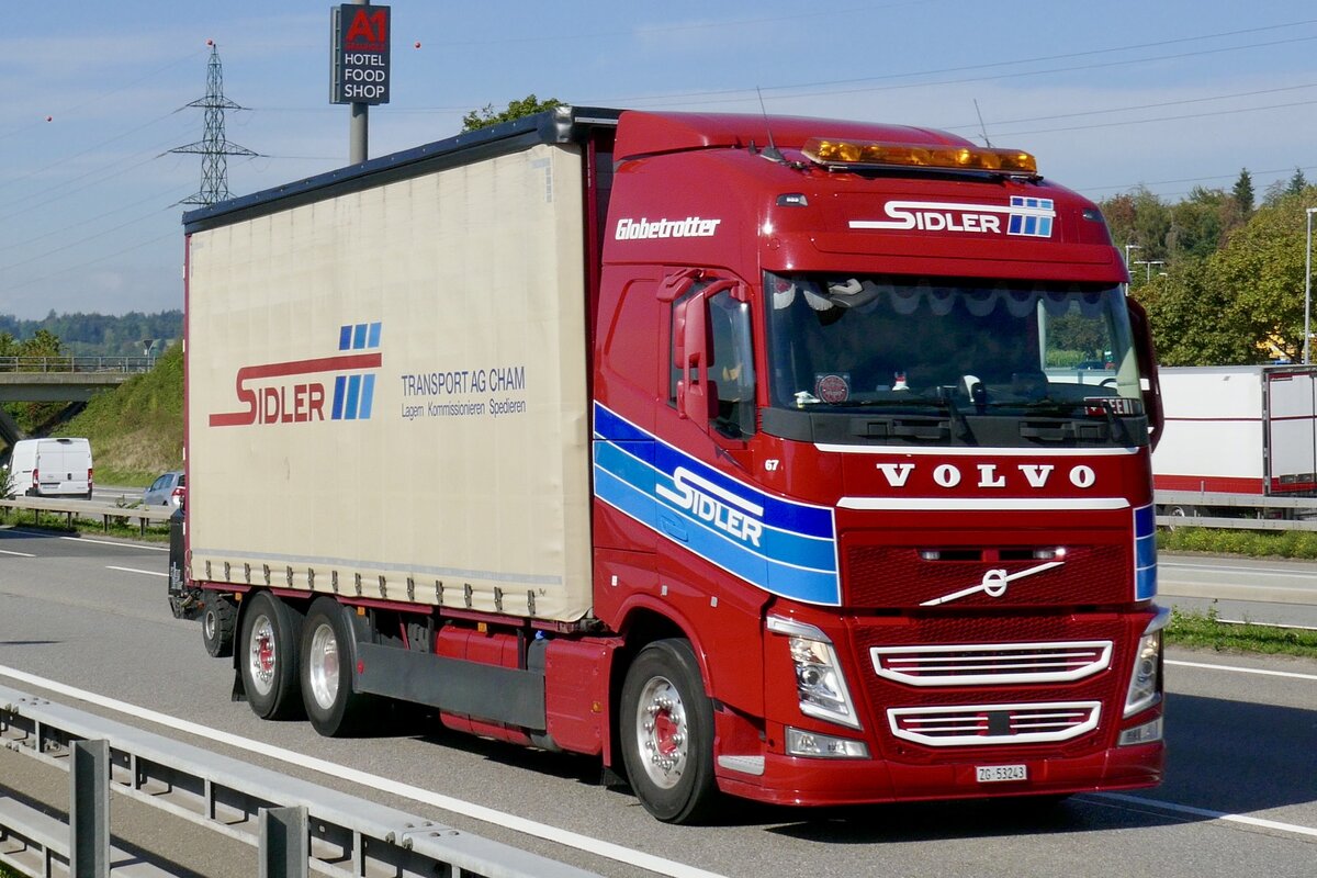 Ein Volvo mit Pritschenaufbau von Sidler am 11.9.26 bei Grauholz.