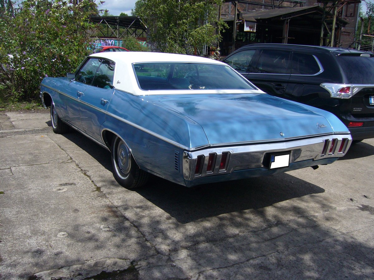 Heckansicht eines Chevrolet Impala fourdoor Sedan des Modelljahres 1970. Altmetall trifft Altmetall am 23.07.2017 im LaPaDu.