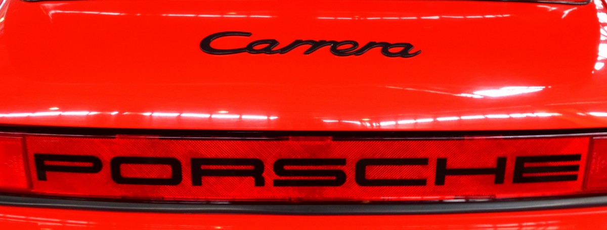 Porsche Carrera, Heckaufschrift an dem bekannten Sportwagen, Feb.2014