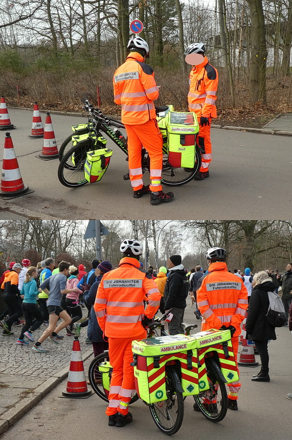 Zwei Rettungssanitäter der Johanniter mit ihren umfangreich ausgestatteten Fahrrädern anläßlich des alljährlichen Silvesterlaufs des SCC Berlin im Berliner Grunewald am 31.12.2019.