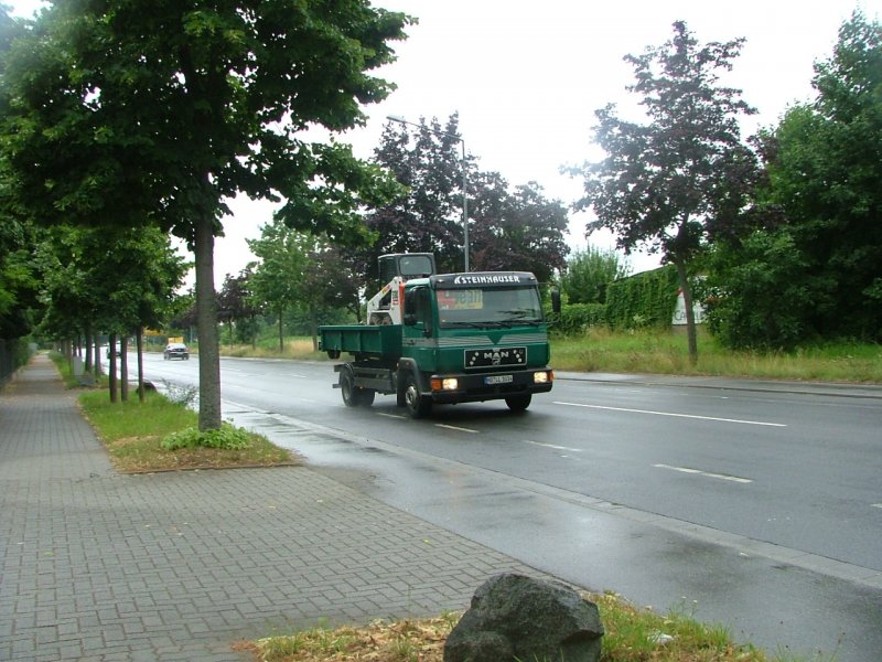 MAN L2000 Abroller mit  Bobcat -Bagger (08.07.09, Bensheim).
