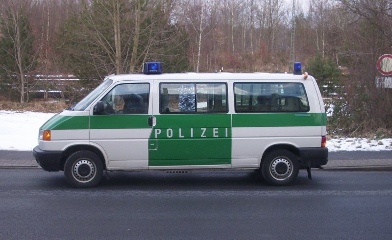 Polizei Streifenwagen bei einer Verkehrskontrolle