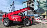 =Manitou-Teleskoplader steht im April 2026 auf einer Baustelle in Erfurt