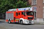 Kombinationsfahrzeug Multistar MAN TGS 18.320 BB Aufbau Magirus der Feuerwehr Lokeren, Aufnahme am 21.07.2011 in Brussel aus Anlass des Nationalfeiertags 
