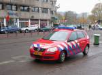 Volkswagen Polo Trendline 1.4 TDI DRF der Feuerwehr Den Haag-Loosduinen. Fotografiert in Den Haag am 01-11-2010.