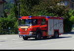 Feuerwehr St. Margrethen ( Scania P 340  SG  698 ) mit Blaulicht und Sirenen Einsatz vor dem Bahnhof in St. Margrethen am 2024.05.10