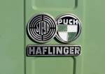 Steyr-Daimler-Puch  Haflinger , Schriftzug und Logo am Khler des leichten Gelndetransporters, das erfolgreiche Fahrzeug mit Allradantrieb wurde in sterreich gebaut von 1959-74 und vorwiegend im