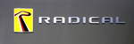 RADICAL, Schriftzug und Logo der 1997 gegründeten britischen Sportwagenfirma, Juni 2017