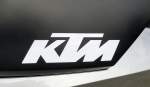 KTM, Tankaufschrift an einem Motorrad Baujahr 2012, die Buchstaben stehen fr die Firma Kronreif&Trunkenpolz in Mattighofen/sterreich, Aug.2013