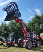 =Weidemann Teleskoplader steht auf einer der Ausstellungsflächen beim Bürgerfest  200 Jahre Landkreis Fulda  auf dem Gelände von Schloß Fasanerie im Juni 2022